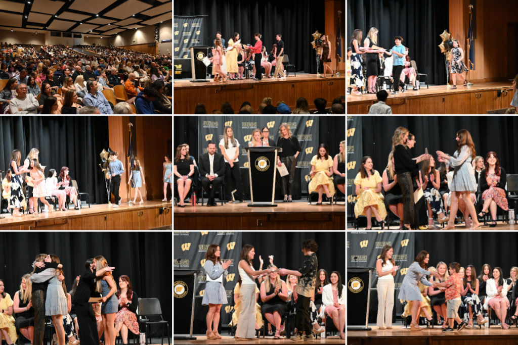 students receiving awards on stage